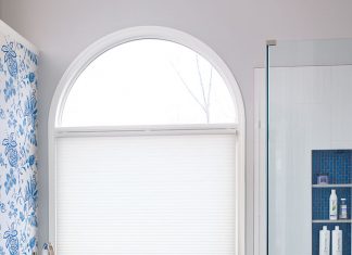 Room envy: A bold wallpaper adds glam to this Kennesaw bathroom
