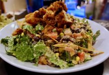 Come to Bad Daddy Burger Bar for the burgers, stay for loaded nachos and huge salads