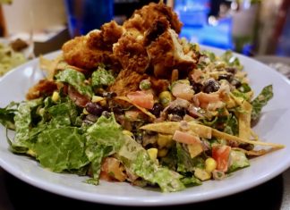 Come to Bad Daddy Burger Bar for the burgers, stay for loaded nachos and huge salads