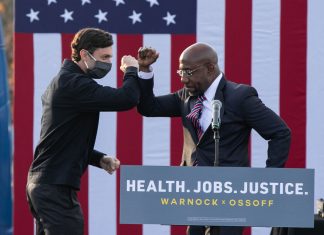 With all eyes on Georgia, Warnock wins and Ossoff ahead