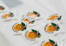 Why do Georgia’s voting stickers now say, “I secured my vote”? Why do Georgia's voting stickers say, "I secured my vote"?