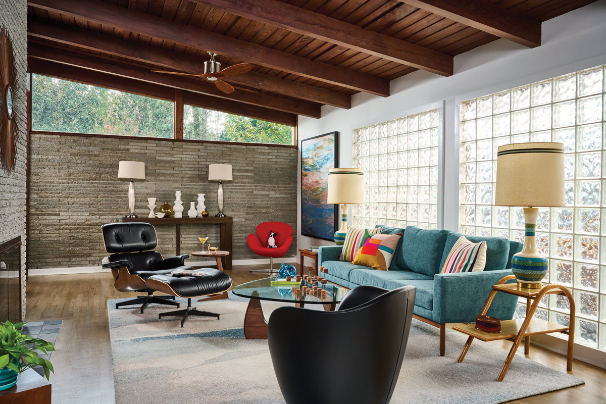 Furniture from Design Within Reach with MCM roots joins authentic lamps from the period. The homeowners bought the abstract painting from an auction selling props used in the Georgia-filmed Netflix show, Ozark.