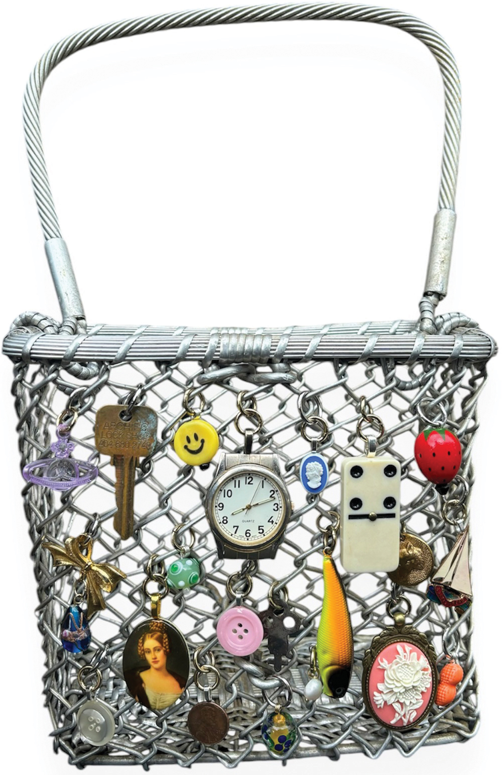Prettiest Lobster’s charms adorn a vintage basket purse