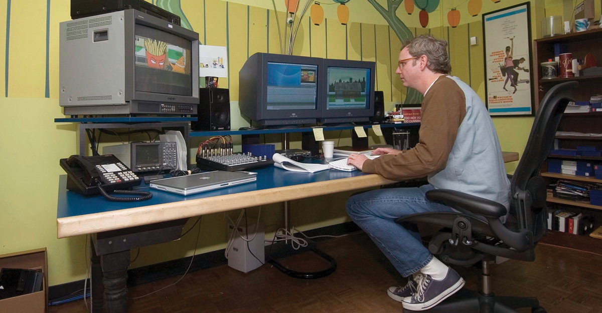 Jay Wade Edwards typing at a computer