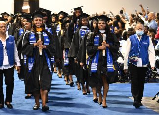 Graduates walking down the aisle at Spelman College