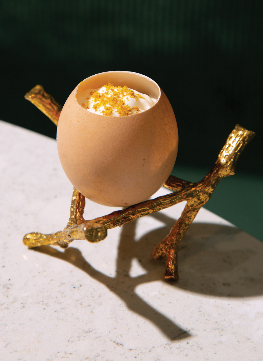A drink in a wood cup holder