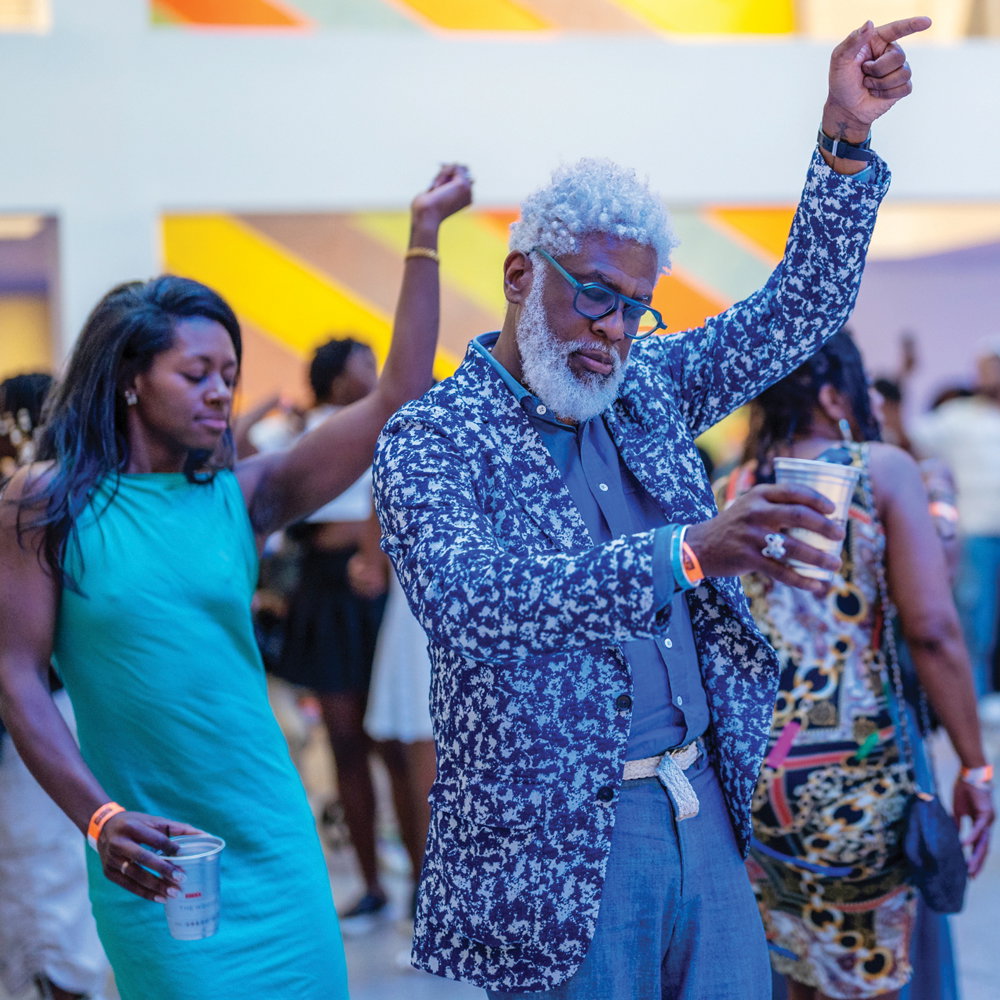 Two people dancing at the High Museum of Art