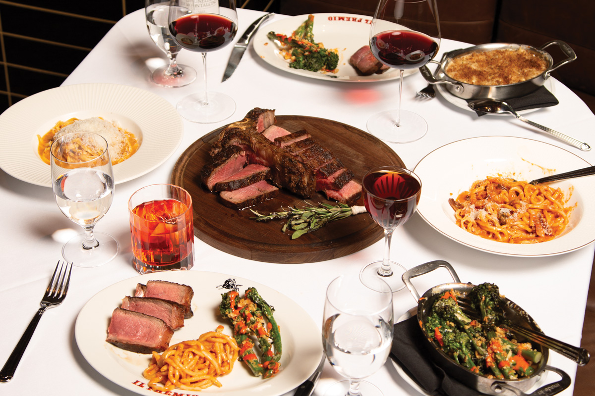 Wagyu beef tartare and a bit of bread, and a spread of bistecca alla Fiorentina, pastas, and broccolini.