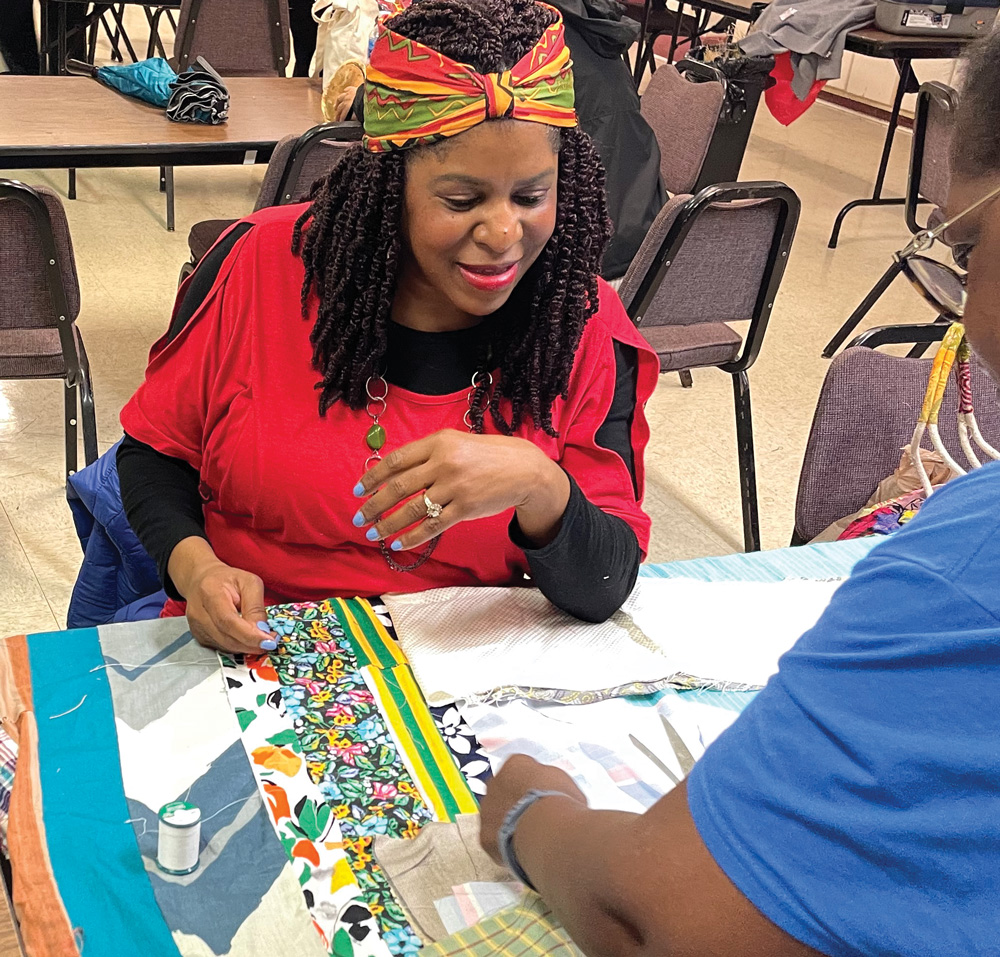 A woman working at a quilting workshop