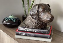 21 places to eat, shop, and hike with your pet in Atlanta one of Dorri Buchholtz's dog artworks sits a top some books