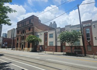 Georgia State and historic preservationists are at odds over the fate of a century-old building 148 Edgewood Avenue