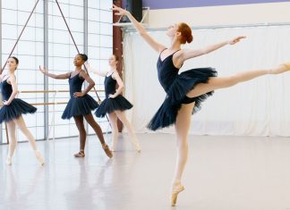 Ballet students practice the arabesque at the Michael C. Carlos Dance Centre