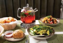 Hidden in Alpharetta, Laghman Express’s dumplings and hand-pulled noodles are drawing crowds an array of dishes and a jug of fruit tea at Laghman Express