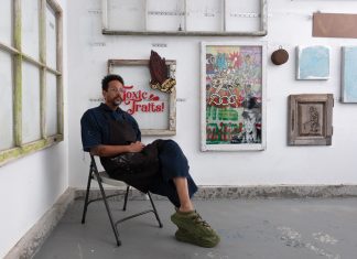 Navin Norling in his Atlanta studio with work from his upcoming exhibition, A Dangerous Game.