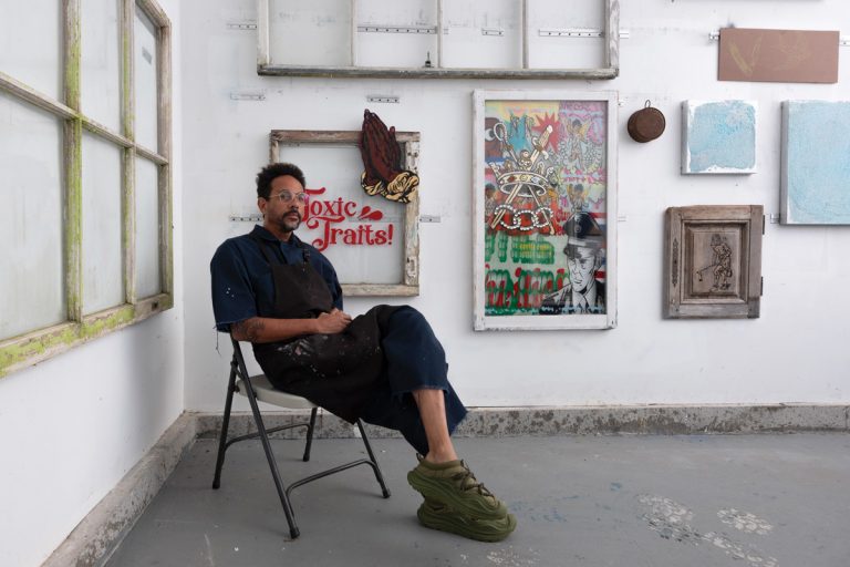 Navin Norling in his Atlanta studio with work from his upcoming exhibition, A Dangerous Game.