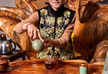 Atlanta’s only traditional Chinese teahouse pours tea—and patience—one cup at a time Amy Zhang wears a ceremonial vest for tea service at Wai’s Gong Fu Tea House.
