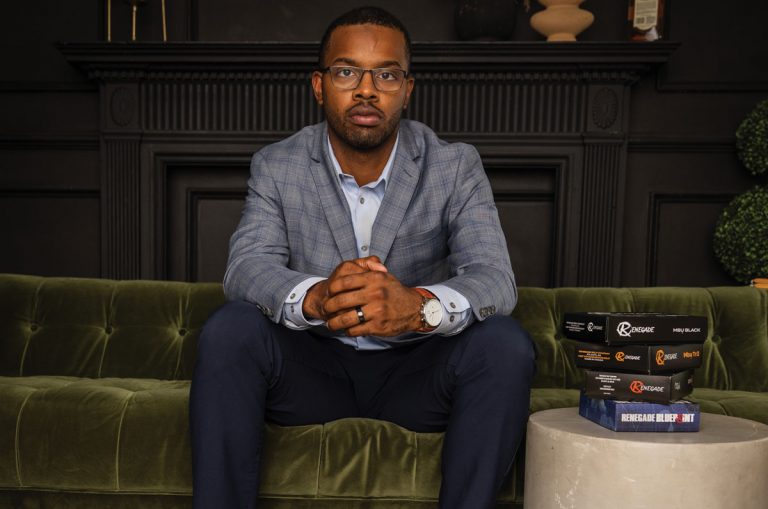 Renegade Golf CEO Kenneth Duncan sits with his hands together