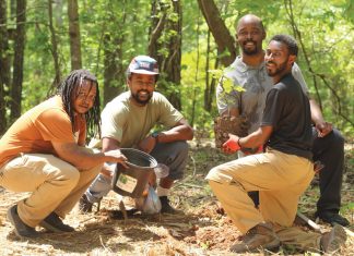Members of the Ashe Legacy Family Farm team (from left) Carlous Moore, Myles Gaines, Todd Alford, and Noah White