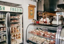 Butcher Stephen Wagner keeps the cases filled at Kinship Butcher & Sundry in Virginia Highland.
