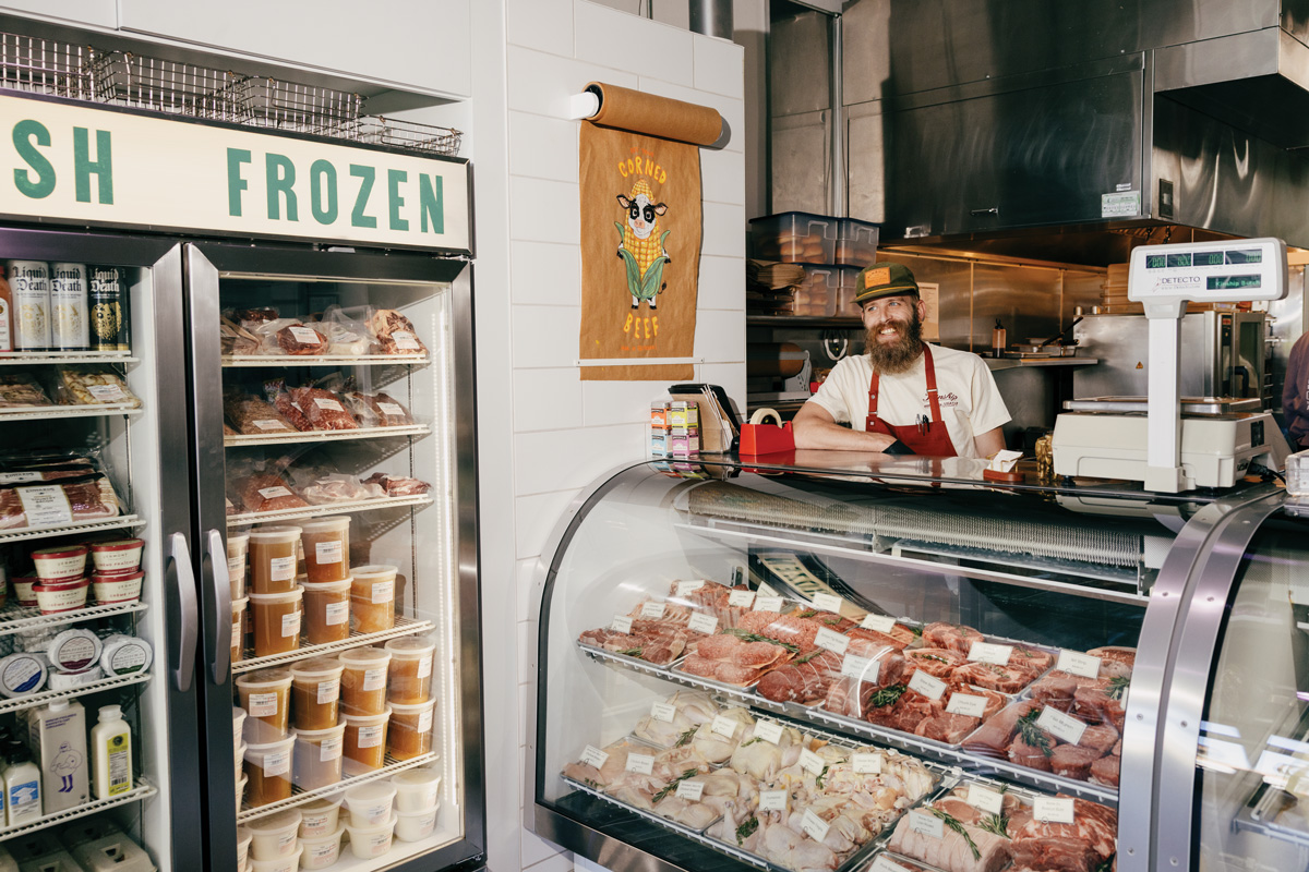 Butcher Stephen Wagner keeps the cases filled at Kinship Butcher & Sundry in Virginia Highland.
