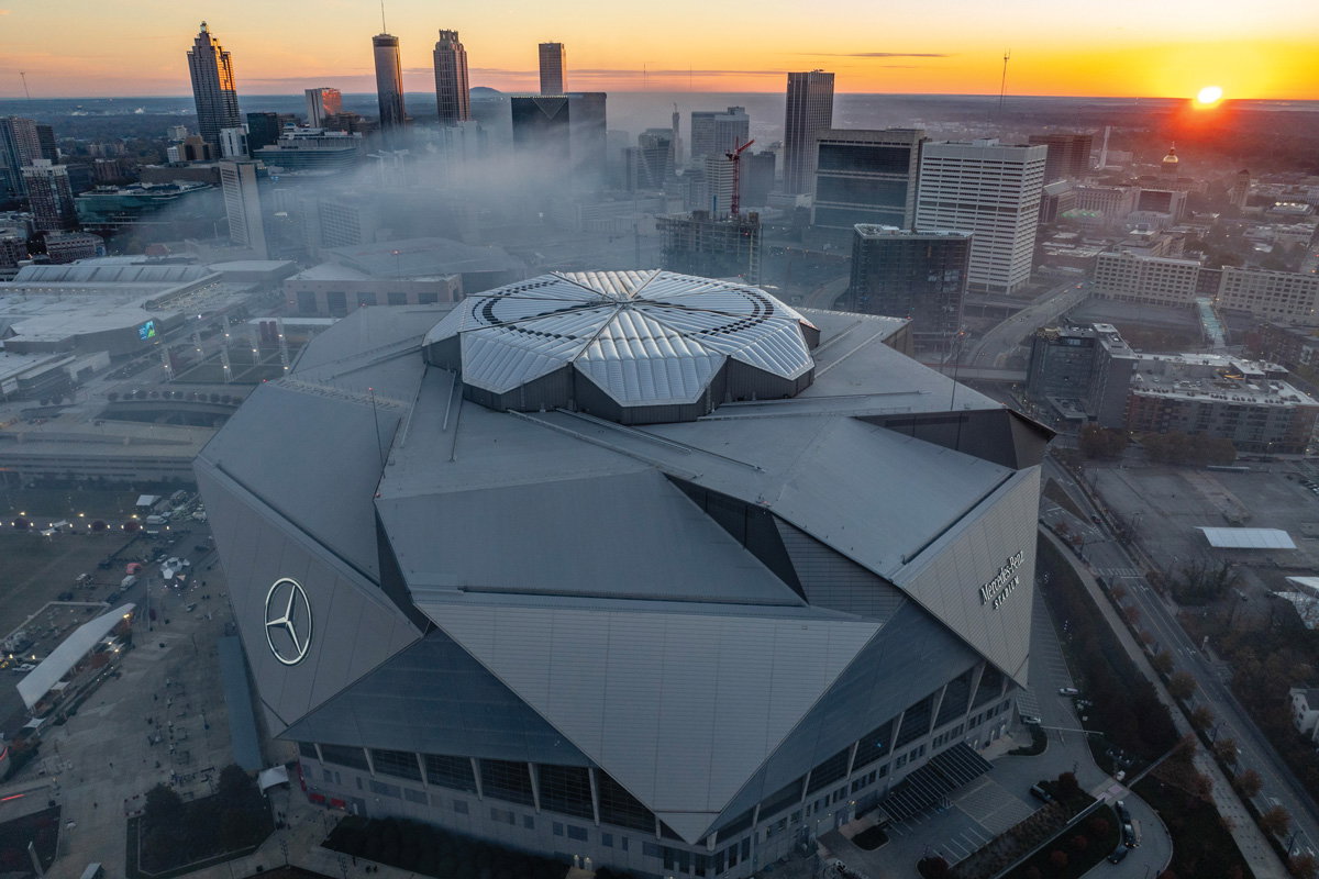 an overhead view of the Mercedes Benz Stadium from outside