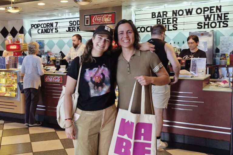 Attendees Grace Harvey (left, in a Lois Reitzes shirt) and Mariana Lombello