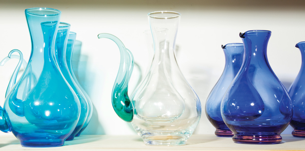 glass pitchers in various blue tones