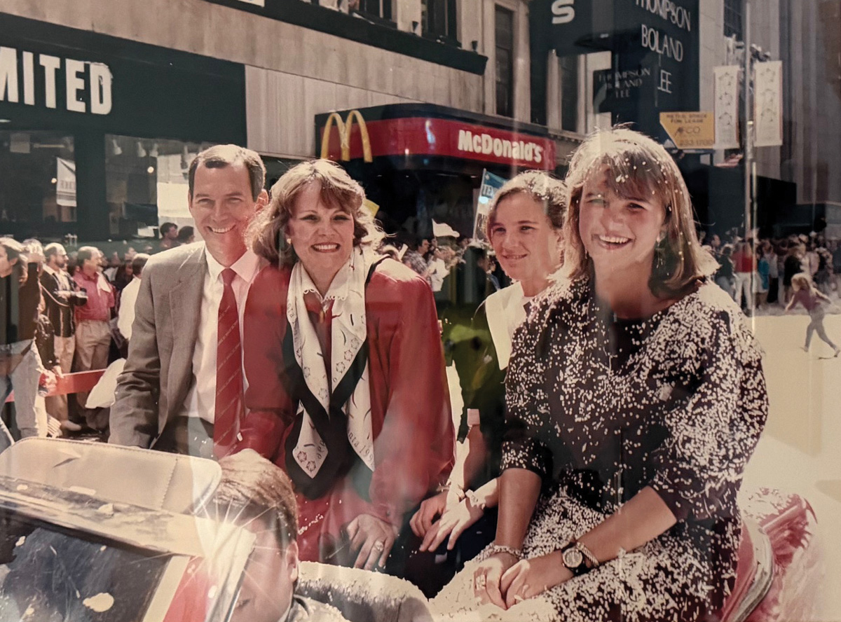 Bill Fowler, Cindy Fowler, Mallory Fowler, and Julie Rackley (nee Fowler) at the 1990 Atlanta parade celebrating the winning Olympic bid