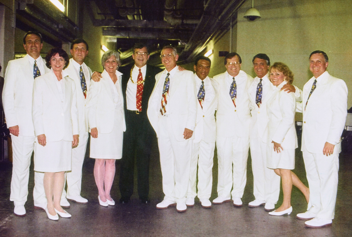 At the 1996 Olympics Closing Ceremony: Charlie Shaffer, Linda Stephenson, Tim Christian, Ginger Watkins, Billy Payne, Horace Sibley, Andrew Young, Charlie Battle, Bobby Rearden, Cindy Fowler, and Peter Candler