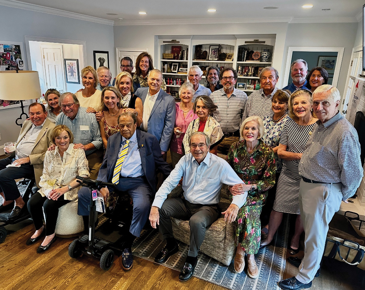 A party celebrating the 35th anniversary of Atlanta winning the vote to host the Games: (front row) Bill Fowler, Cindy Fowler, Andrew Young, Billy Payne, Martha Payne, Shannon Candler, Peter Candler; (second row) Kay Lee, Charlie Battle, Susan Watson, Linda Stephenson, Lola Battle; (third row) Jane Steward, Nancy Thomas, Harry Shuman, Sandy Jernigan, George Hirthler, Ralph Jernigan; (fourth row) Ross Henderson, Mason Stephenson, Mike Plant, Mary Plant; (fifth row) Jeff Cravens, Cathy Cravens, Victor Rodriguez