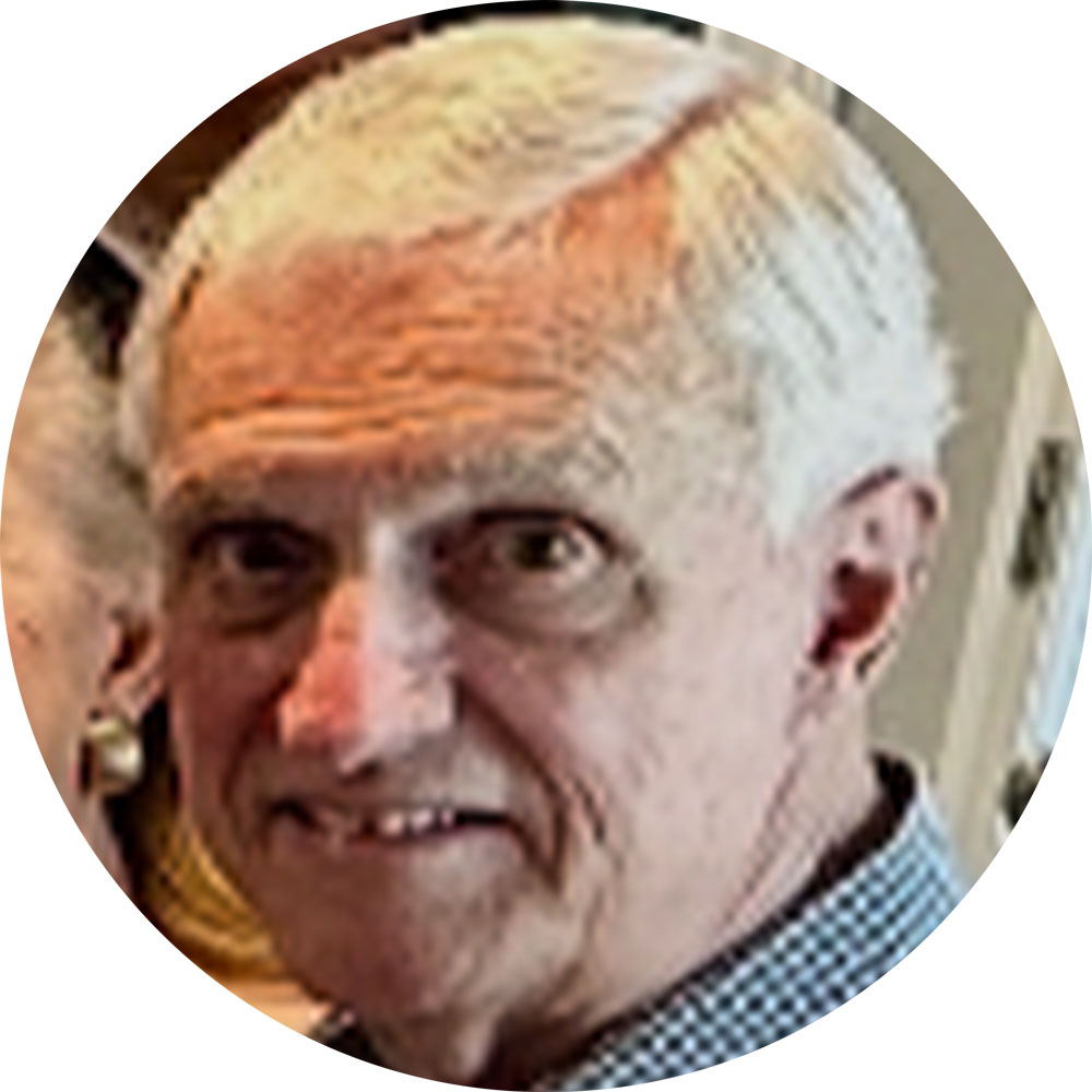A headshot of Peter Candler