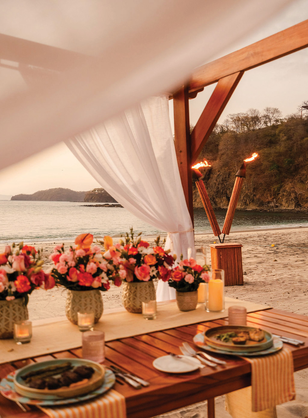 Three-course beachfront dinner while taking in a Costa Rican sunset