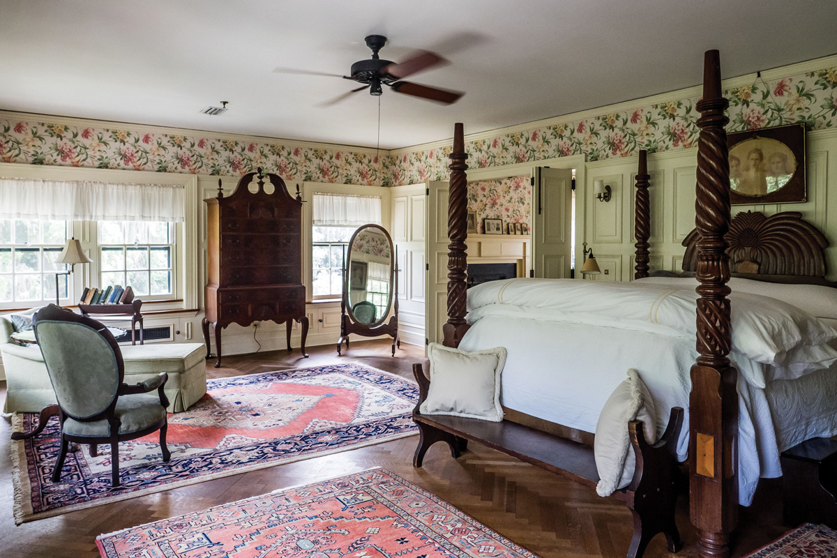 Inside one of the Greyfield Inn's rooms containing antique furnishings but no televisions