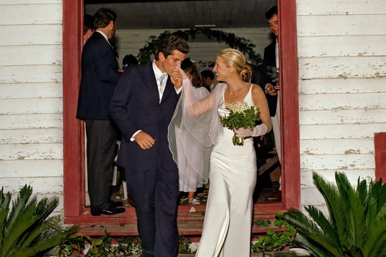 John F. Kennedy Jr. and Carolyn Bessette exiting The First African Baptist Church