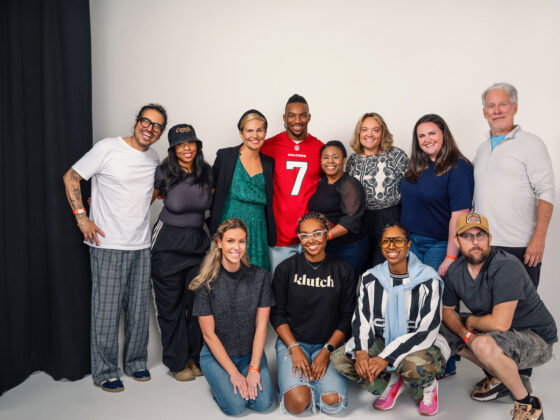 Bijan Robinson with the Atlanta magazine team and partners during the cover shoot at the Falcons Training Facility