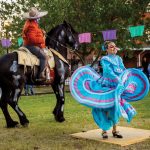 Día de Muertos Celebration with dancers and horse riding