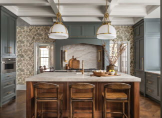 Renovation Inspiration: 4 Atlanta kitchens where form meets function a rustic kitchen with a marble and wooden island in the middle and two overhead lamps above it