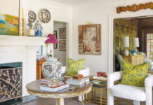A designer’s Macon home showcases antiques, art, and eclectic design The house's living room with thick baseboards, crown molding, and an ornate fireplace