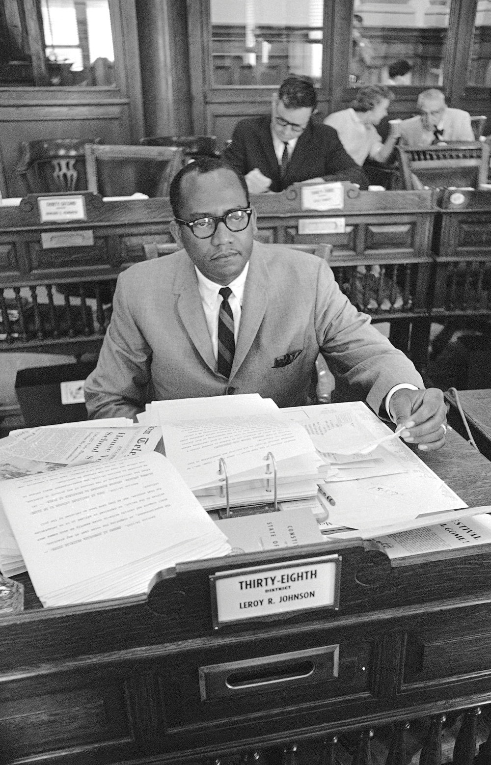 State Senator Leroy Johnson at his legislative desk in 1964.