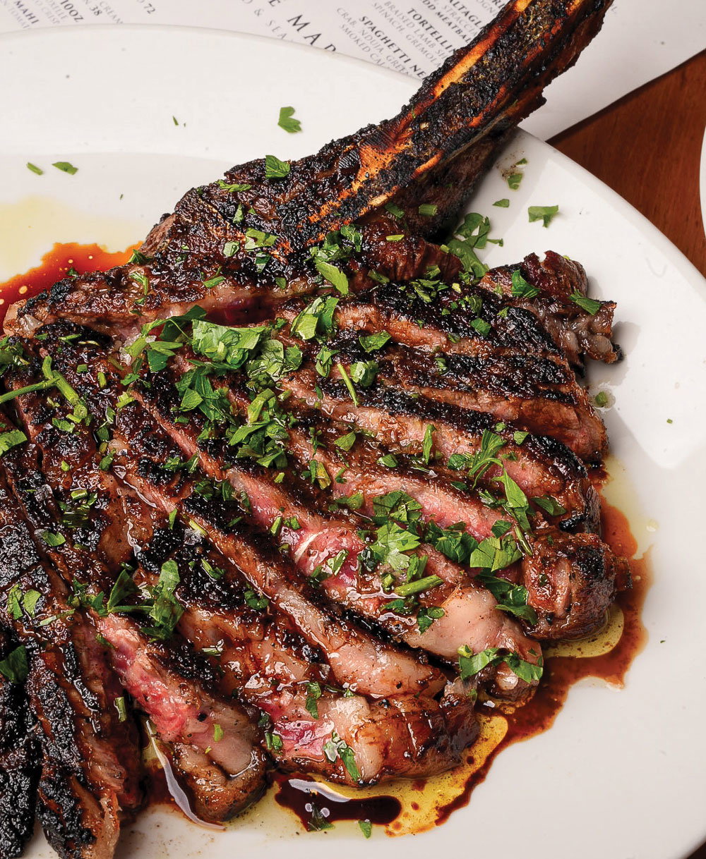 Strips of signature steak covered in cilantro