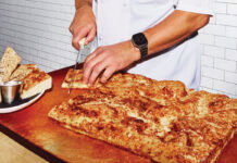 Atlanta’s 10 Best Steakhouses: Kaiser’s Chophouse Peter Kaiser cuts bread