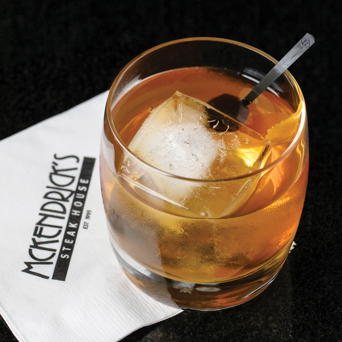 An old fashioned cocktail on a McKendrick's napkin