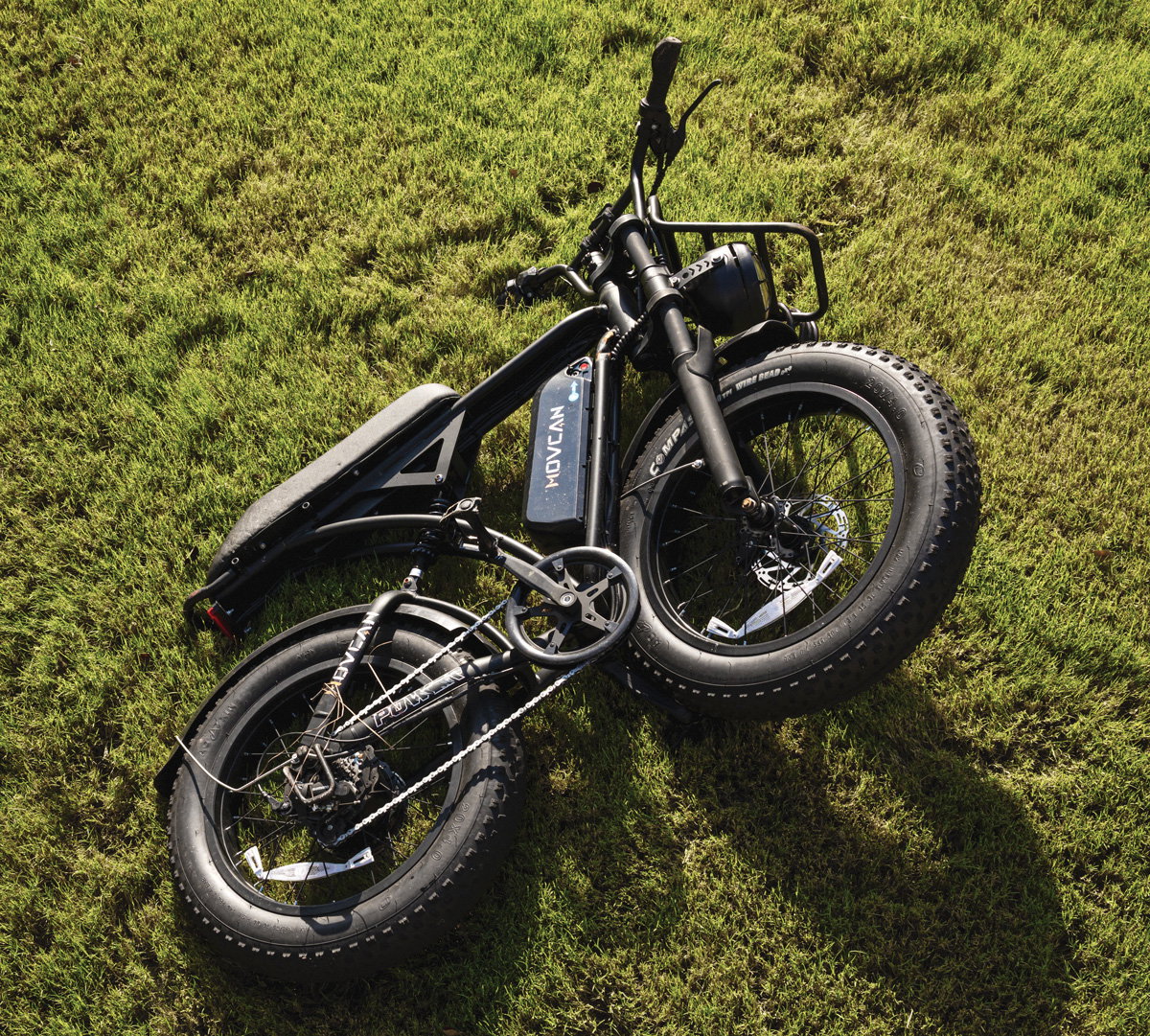 The Movcan v60 that teen Carter Moore was riding, laying on the grass