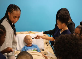 Sixth graders wear scrubs at this new Atlanta charter academy that trains students for healthcare careers